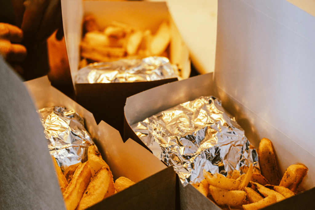 chicken and fries on chicken coop