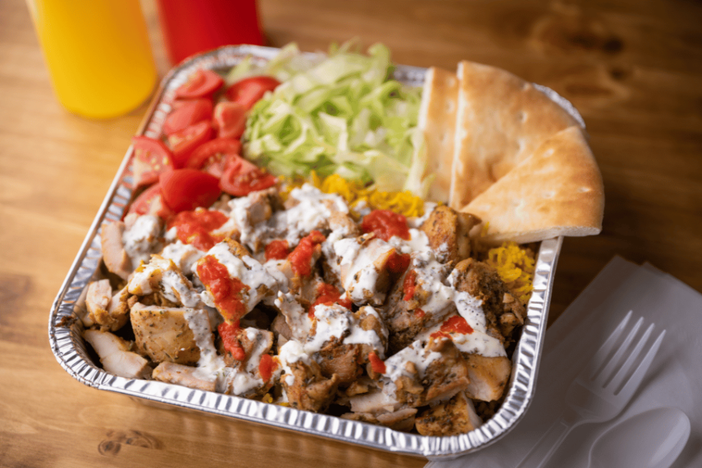 Chicken Coop NY lamb over rice